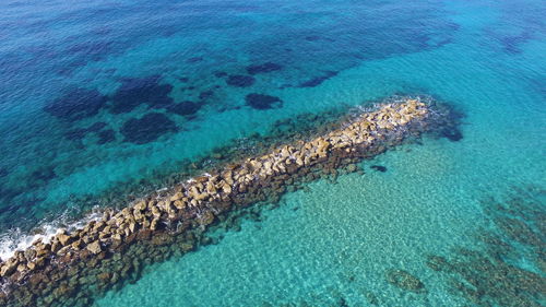 High angle view of blue sea