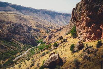 High angle view of rocky mountains against sky