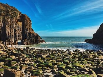 Scenic view of sea against blue sky