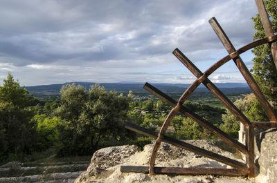 Built structure on landscape against sky