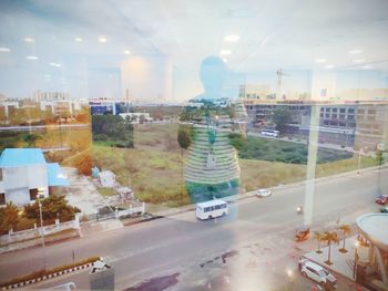 Digital composite image of illuminated cityscape