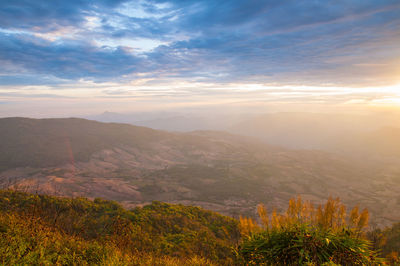 Scenic view of mountains at sunset