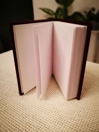 Close-up of open book on table