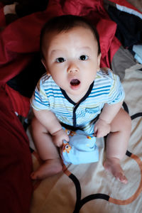 Portrait of cute baby boy looking at camera