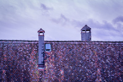 Low angle view of old building against sky