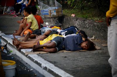 Men lying on floor