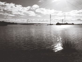 Scenic view of sea against cloudy sky