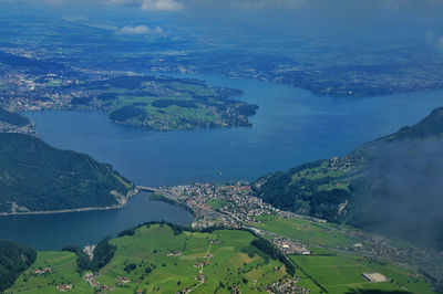 Aerial view of river amidst landscape against sky