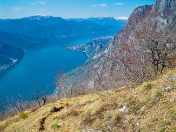 Scenic view of mountains against blue sky