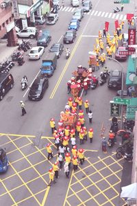 High angle view of people on street during traditional festival