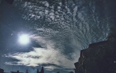 Low angle view of rocks against sky