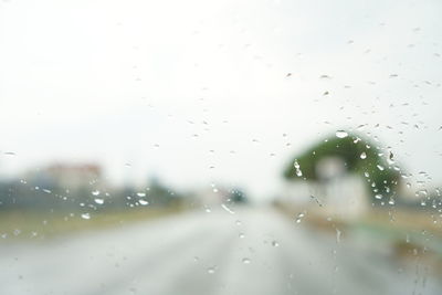 Close-up of water drops on glass