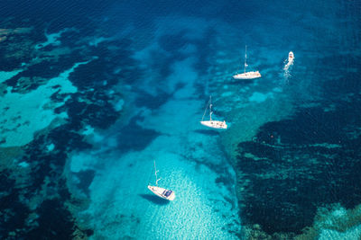 High angle view of sailboat in sea