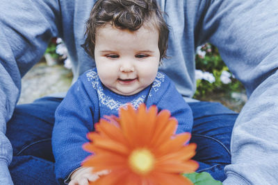 High angle view of boy on grassy field