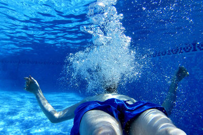 Man swimming in sea