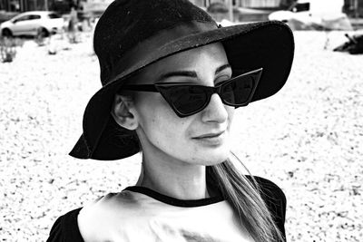 Portrait of young woman wearing sunglasses