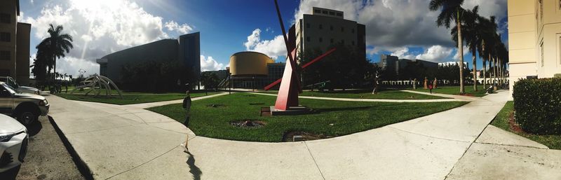 Panoramic view of park in city against sky