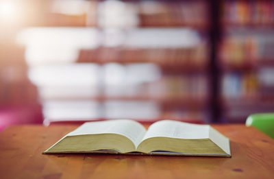 Close-up of open book on table