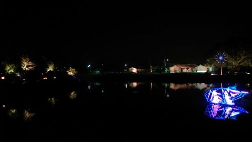 Reflection of buildings in calm water