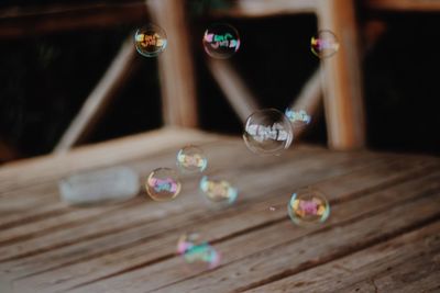 Close-up of bubbles over table