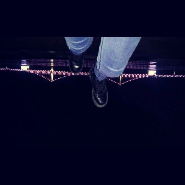 indoors, dark, shoe, low section, illuminated, night, absence, person, hanging, footwear, copy space, flooring, lighting equipment, chair, reflection, empty, shadow, light - natural phenomenon