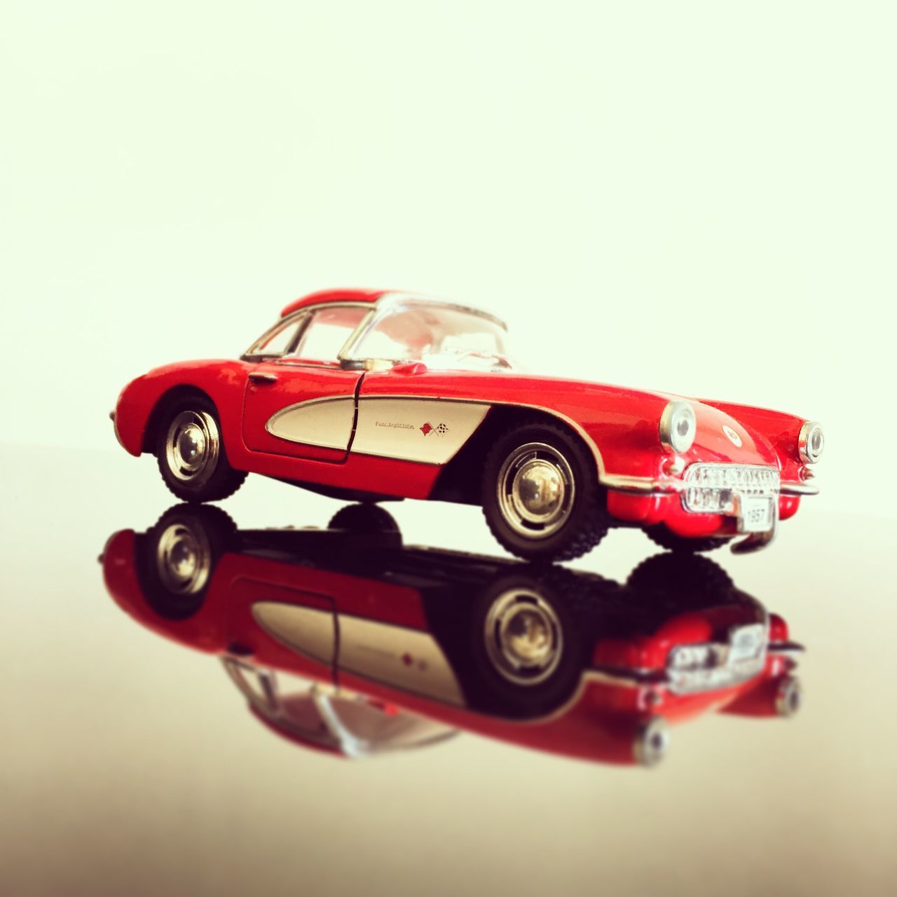 copy space, red, transportation, studio shot, close-up, white background, single object, land vehicle, clear sky, still life, mode of transport, toy, car, technology, old-fashioned, no people, retro styled, man made object, day, selective focus