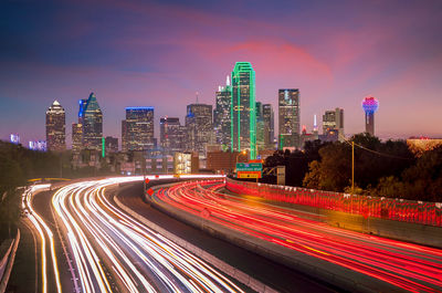 High angle view of light trails on road at night