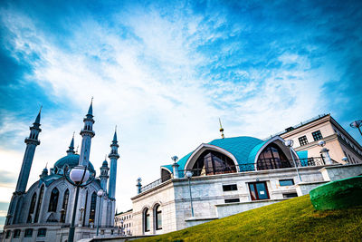 Low angle view of building against blue sky