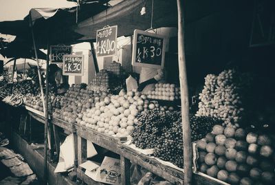 Fruits arranged at market for sale