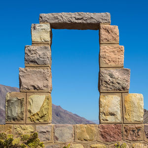 Stone arch doorway at pucara de tilcara