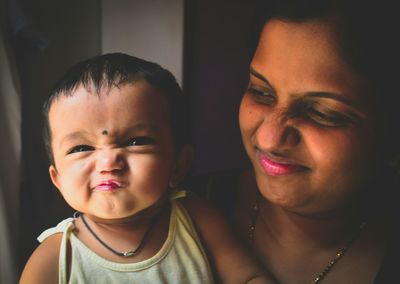 Close-up of mother with baby