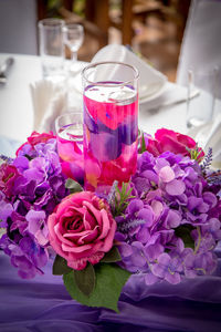 Close-up of pink roses on table