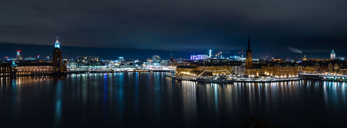 Illuminated buildings in city at night