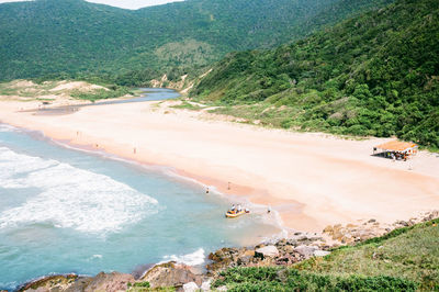 High angle view of beach against mountains