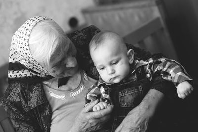 Grandmother with grandson at home