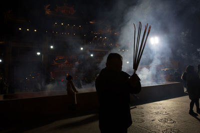 Rear view of people at music concert
