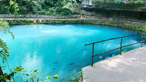 High angle view of swimming pool by lake