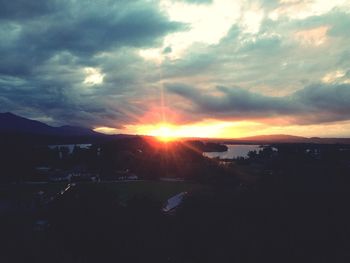 Scenic view of landscape against cloudy sky