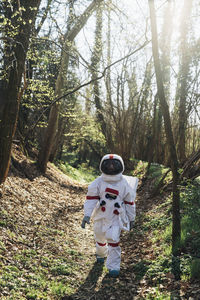 Man standing in forest