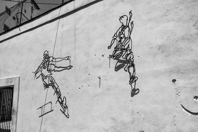 Low angle view of graffiti on wall