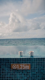 Scenic view of sea against sky at maldives for honeymoon 