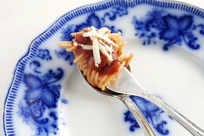 Close-up of pasta in plate on table