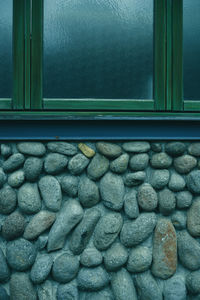 Close-up of pebbles window