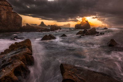 Scenic view of sea against sky during sunset