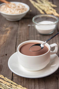 High angle view of coffee cup on table