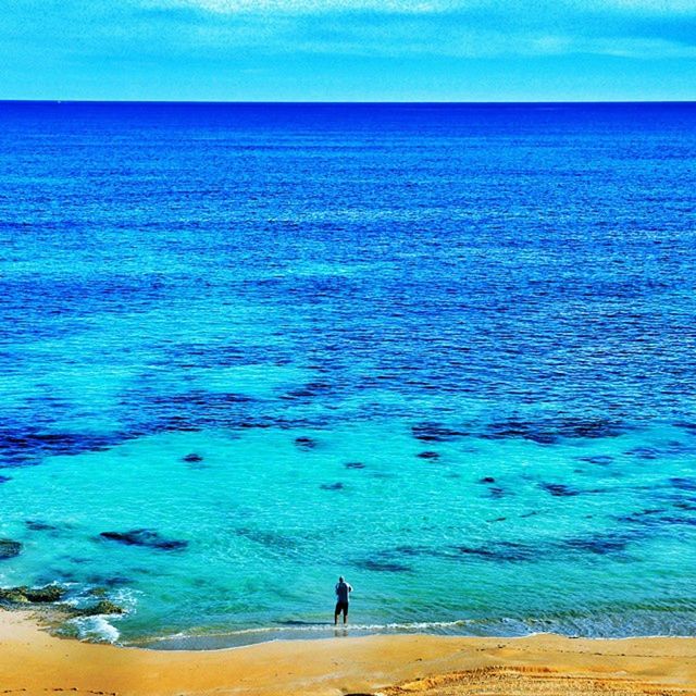 sea, water, blue, horizon over water, tranquil scene, tranquility, scenics, beach, beauty in nature, nature, shore, vacations, idyllic, leisure activity, seascape, rippled, lifestyles, sand