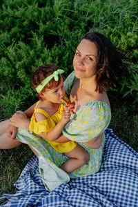 Portrait of smiling mother and daughter