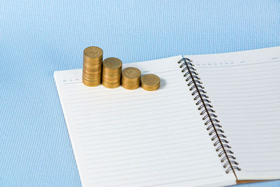 High angle view of coins on table
