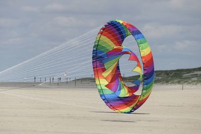 Multi colored umbrella on beach