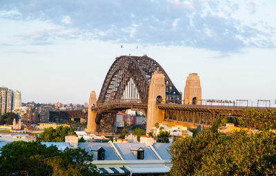 View of bridge against cloudy sky